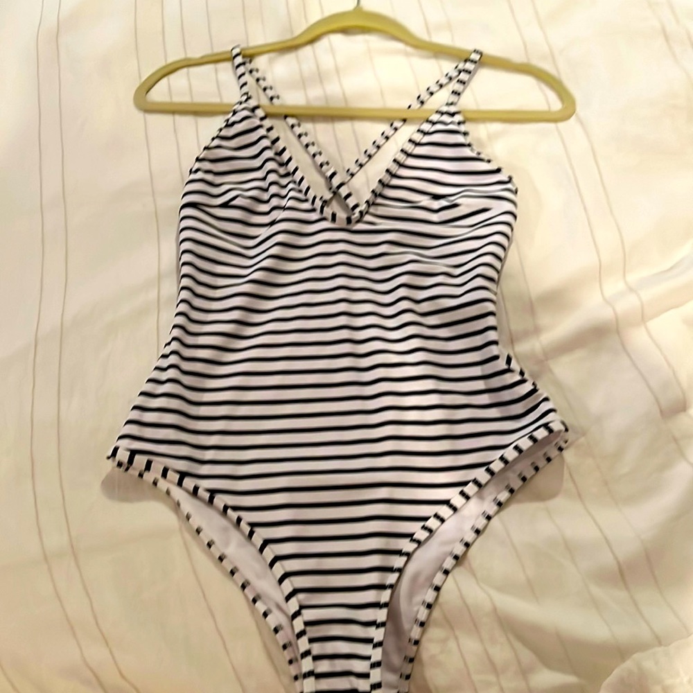 White and black striped swimsuit/bodysuit.